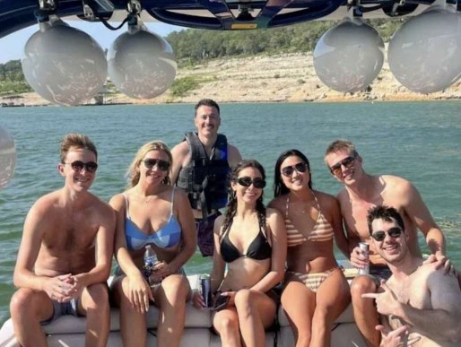 Group of friends relaxing aboard a Dream Charters boat